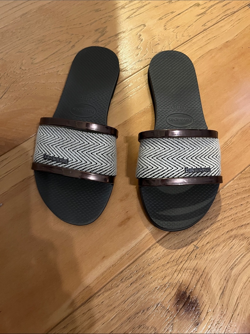 Havaianas Black Slides with White Chevron Strap and Brown Trim